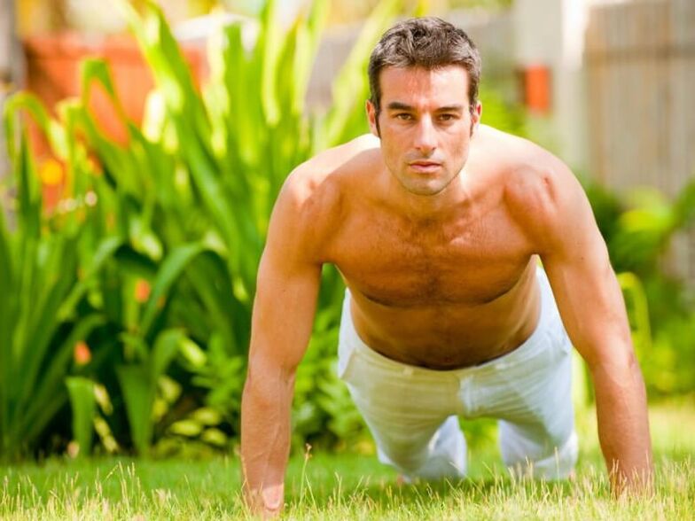 Man exercises to enlarge penis head