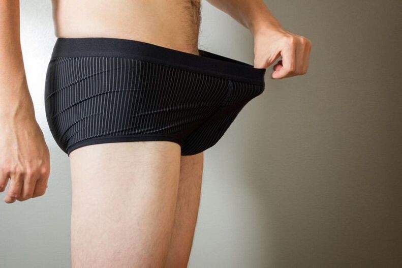 a man looked down at his pants and wanted to enlarge his penis with soda